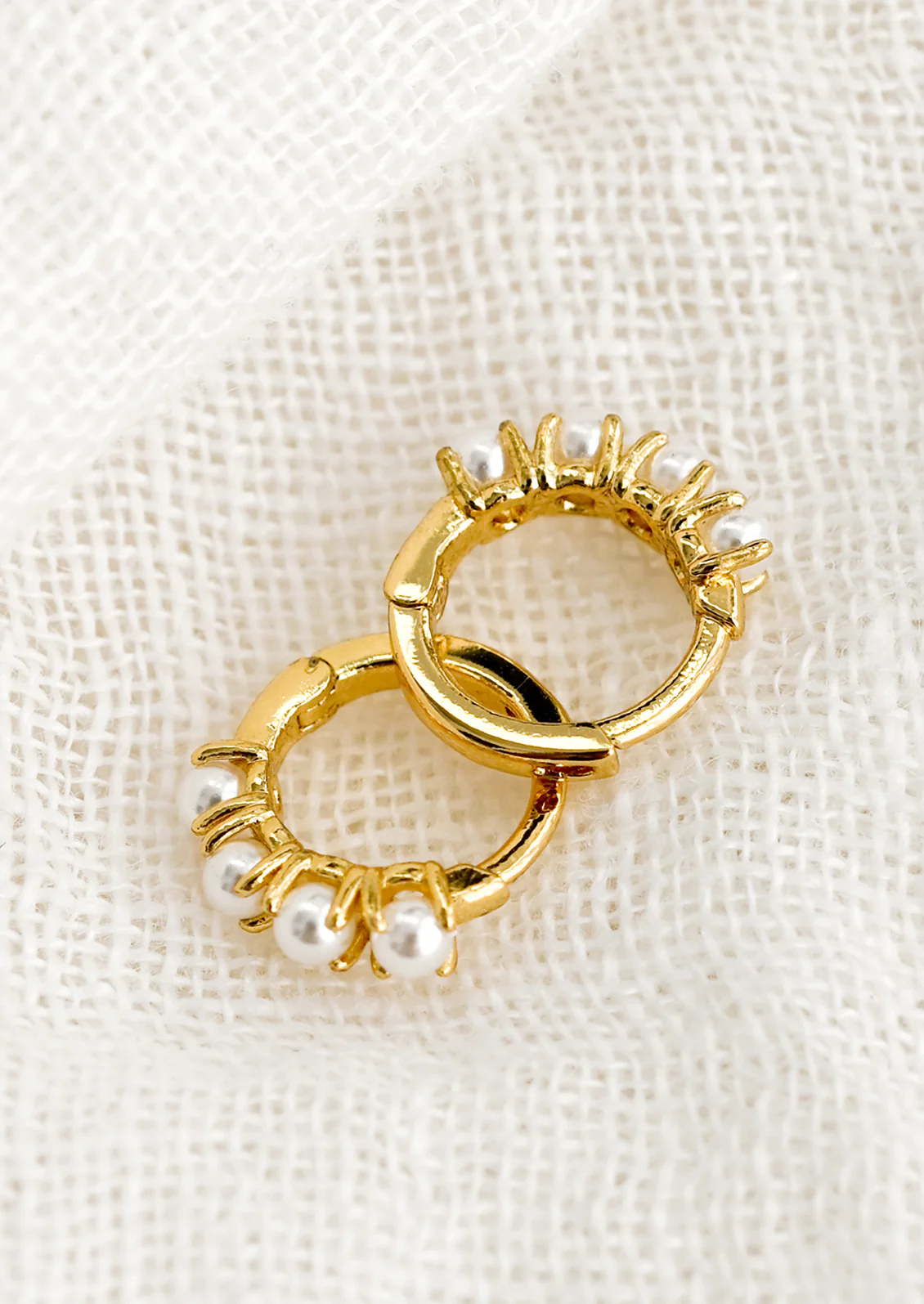 Tiny Pearl Huggie Earrings - Image 2
